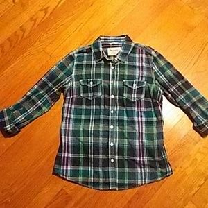 A button up tee-shirt